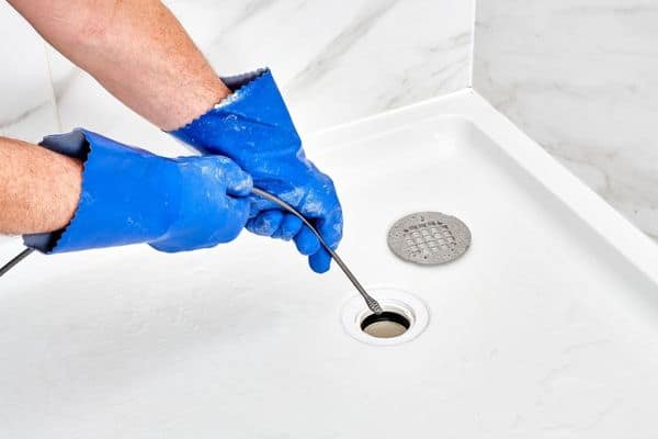 how to unclog a shower drain with standing water